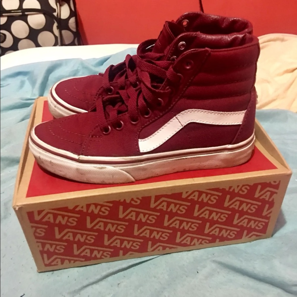 Burgundy and white vans